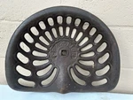Antique Cast Iron Tractor Seat Champion. Fixed Price $100.00.
