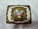 Vintage Trinket Box Porcelain Top Red Inside Footed Hinged Square Jewelry Couple. Fixed Price $8.00.